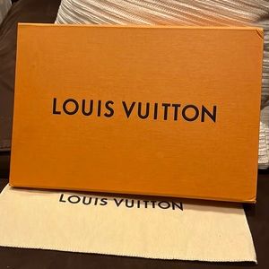 Barely used Louis Vuitton pouchette. ID tag MB2178.